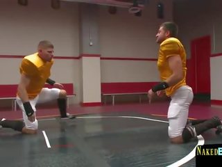 Muscly stud sucks phallus immediately following wrestling match